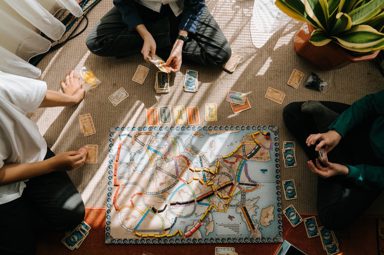A family playing a board game at home